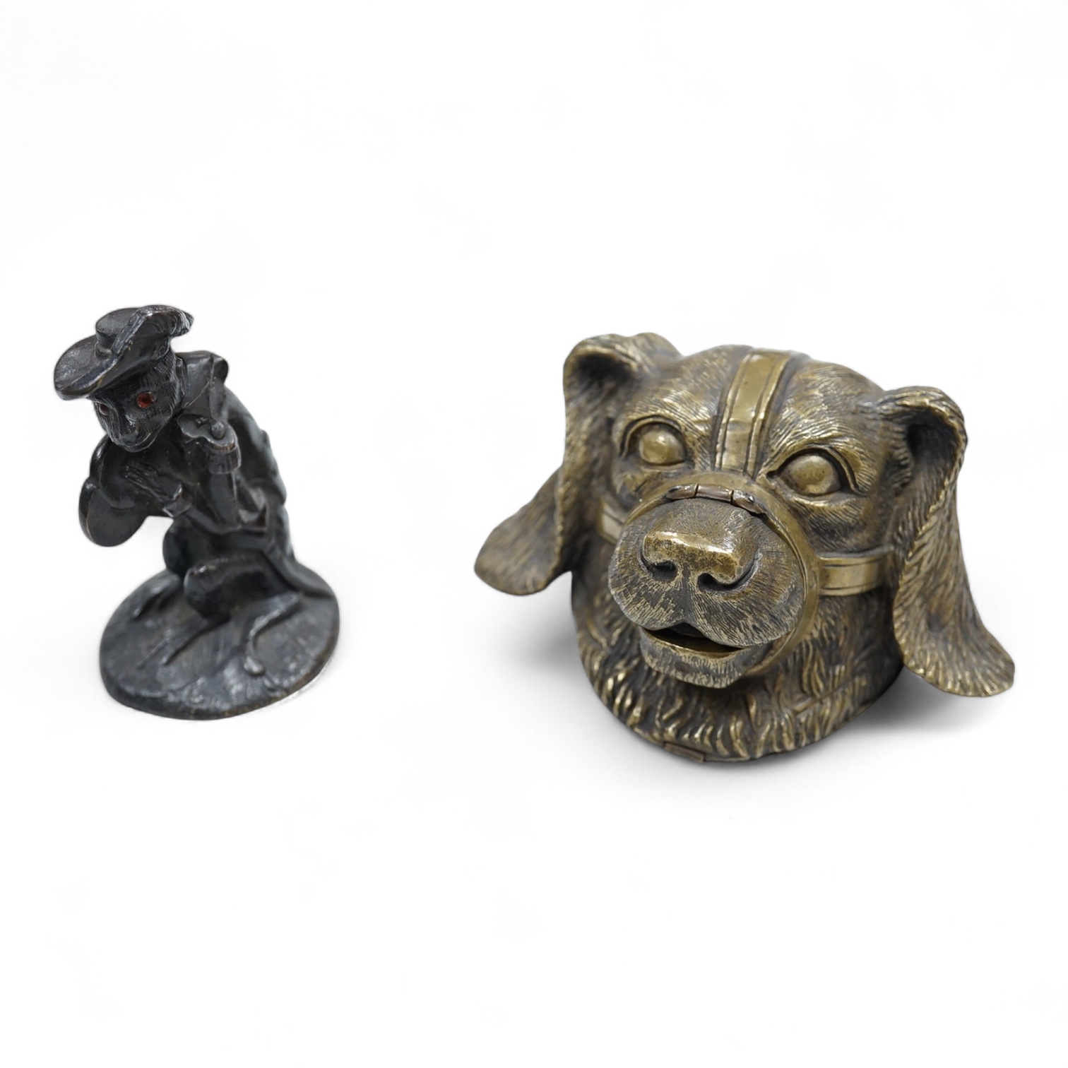A novelty dog's head Pastille burner and bronze monkey, largest 11cm wide